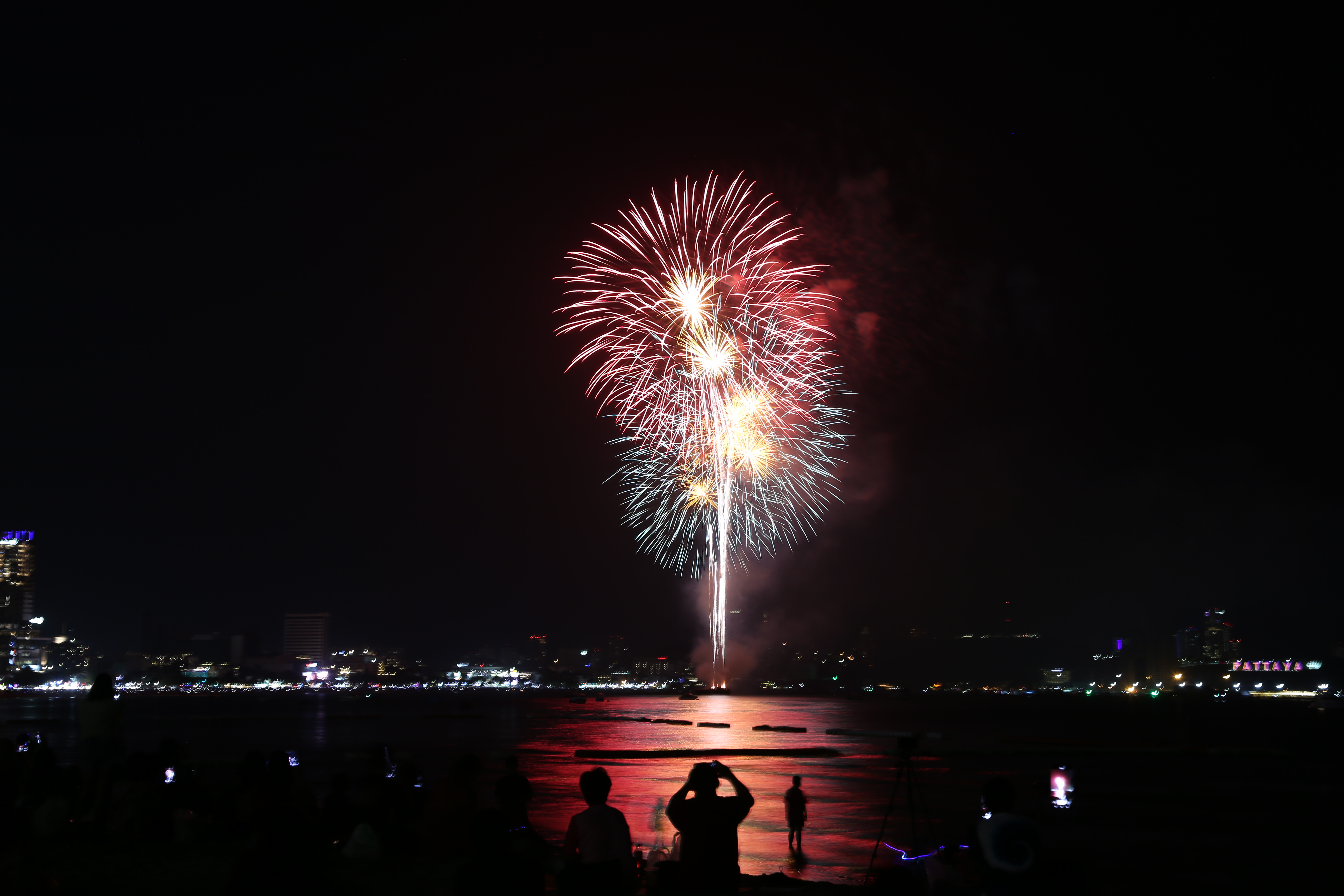 Colorful fireworks sequence over Pattaya Bay